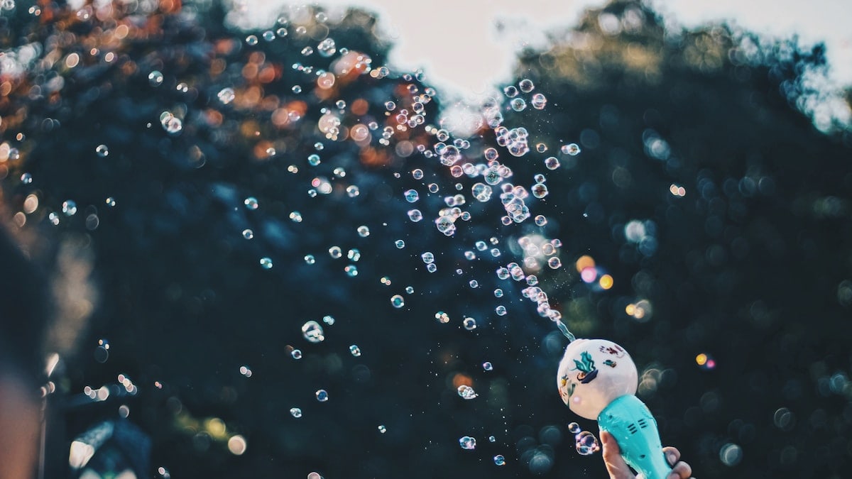 person's hand holding bubble toy
